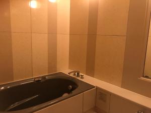 Koupelna v ubytování HOTEL Fairy tale 養父店