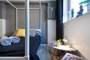 Posteľ alebo postele v izbe v ubytovaní ClickTheFlat Constitution Square Apart Rooms