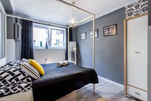 Posteľ alebo postele v izbe v ubytovaní ClickTheFlat Constitution Square Apart Rooms