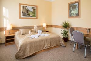 Posteľ alebo postele v izbe v ubytovaní Aquasol Resort