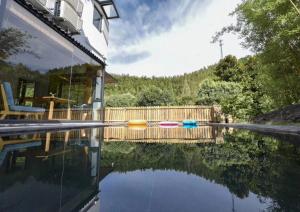 Bazén v ubytování Villa EN Emerald Valley, Huangshan nebo v jeho okolí
