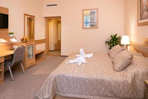 Posteľ alebo postele v izbe v ubytovaní Aquasol Resort