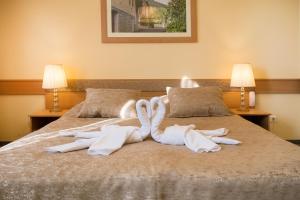 Posteľ alebo postele v izbe v ubytovaní Aquasol Resort