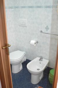 Vannituba majutusasutuses Albergo Astro