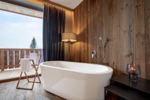 Fotografie z fotogalerie ubytování ALMMONTE SENSUM SUITES Boutique Hotel v destinaci Wagrain