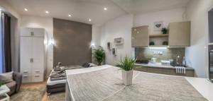 Posteľ alebo postele v izbe v ubytovaní Diamond Apartman