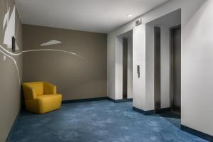 Posezení v ubytování Holiday Inn - the niu, Welly Kiel by IHG