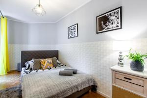 Krevet ili kreveti u jedinici u okviru objekta ClickTheFlat Wilcza Street Apart Rooms