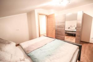 Postel nebo postele na pokoji v ubytování Landhaus zur Tanne