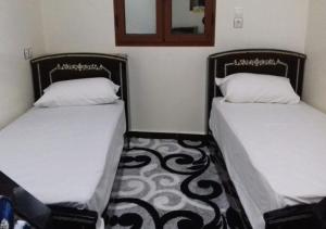Cama o camas de una habitación en Le Gite De Sidi Rbat