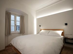Posteľ alebo postele v izbe v ubytovaní Hotel kontor