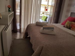 A bed or beds in a room at Residencial Colibrí