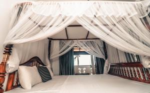 Postel nebo postele na pokoji v ubytování Il Nido Beach Home