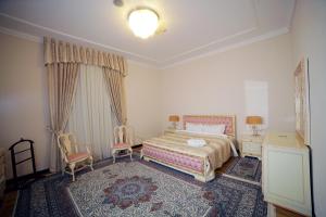 Een bed of bedden in een kamer bij Residence Park Hotel