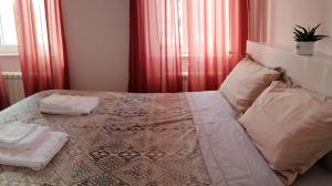 Postel nebo postele na pokoji v ubytování Casa Rafut