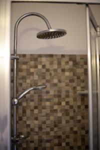 A bathroom at Elisir Suite Rooms by Marino Tourist