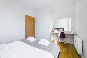 Posteľ alebo postele v izbe v ubytovaní Apartament Olsztyński - Lake Apartments, osiedle Calamo Park - Olsztyn