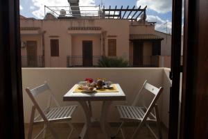 A balcony or terrace at Elisir Suite Rooms by Marino Tourist