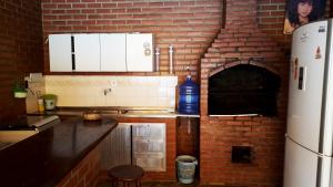 Kuchyňa alebo kuchynka v ubytovaní Morada Recanto das Flores