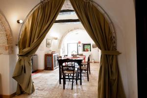 Posezení v ubytování Trullo Dimora della Valle