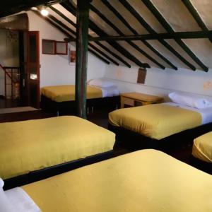 Cama o camas de una habitación en Cedron Hostel