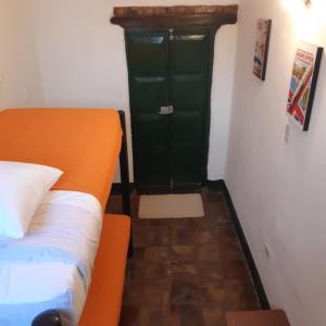 Cama o camas de una habitación en Cedron Hostel