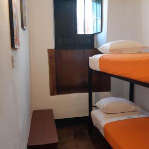 Cama o camas de una habitación en Cedron Hostel