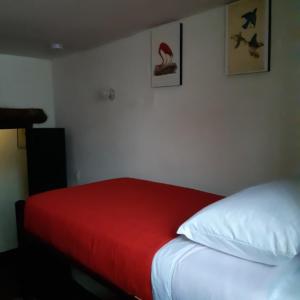 Cama o camas de una habitación en Cedron Hostel