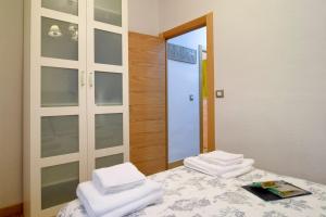 Postel nebo postele na pokoji v ubytování SWEET HOME ÁVILA + 23 fotografií