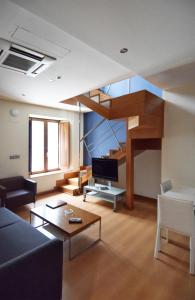 Zona de estar de Apartamentos María Luisa