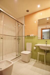 Un baño de Apartamentos María Luisa