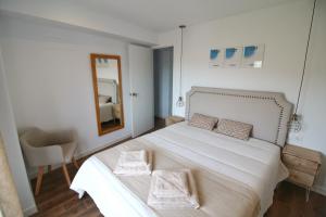 Postel nebo postele na pokoji v ubytování La Baranda de Priego