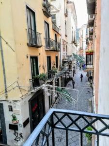 an empty street in a city with buildings at B&B PETER PAN in Salerno
