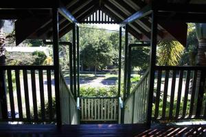 a wooden gazebo with a view of a park at True North B&B in Horseshoe Bay