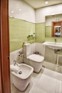Un baño de Apartamentos María Luisa