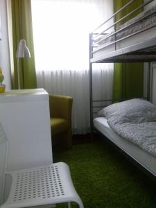 Poschodová posteľ alebo postele v izbe v ubytovaní Miramar