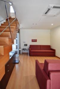 Zona de estar de Apartamentos María Luisa
