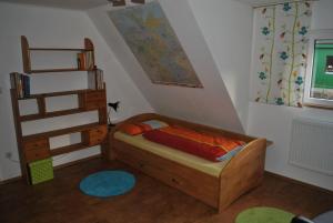En eller flere senger på et rom på Ferienwohnung Giessl