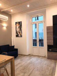 A television and/or entertainment centre at Kibilù - Viale Bligny - Porta Romana - Università Bocconi