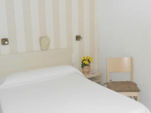 Postel nebo postele na pokoji v ubytování Hotel Tramontana