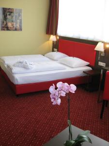 Posteľ alebo postele v izbe v ubytovaní Best Western Plus Amedia Art Salzburg