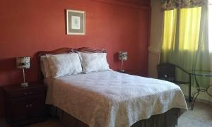 Кровать или кровати в номере Casa San Benito