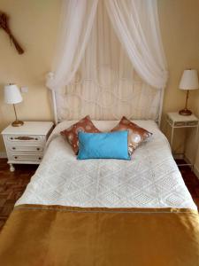 En eller flere senge i et værelse på Los Balcones - Alojamiento Rural en Sigüenza