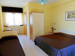 Postel nebo postele na pokoji v ubytování B&B Angela