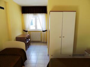 Postel nebo postele na pokoji v ubytování B&B Angela