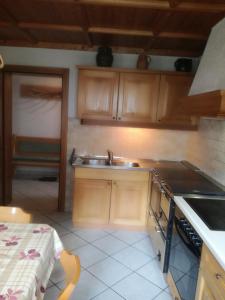 a kitchen with a sink and a counter top at Apartment Vorderstoder in Rossleithen