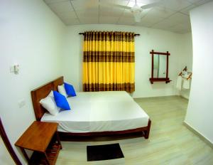 Letto o letti in una camera di Rock View Home Stay