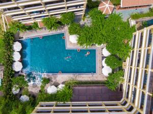 an overhead view of a swimming pool in a resort at Hoi An Central Boutique Hotel & Spa (Little Hoi An Central Boutique Hotel & Spa) in Hoi An