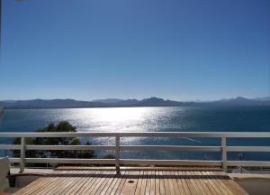 a view of the water from the deck of a house at Atlas-Unlimited Sea View Apartment in Loutraki
