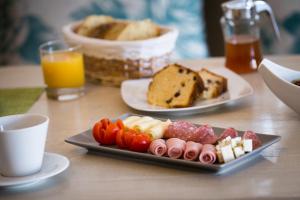 Фотография из галереи Afroessa Hotel Santorini в городе Имеровигли +109 фотографий